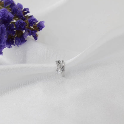 Σκουλαρίκια cuff με πέτρες ζιργκόν Isidora Cuff